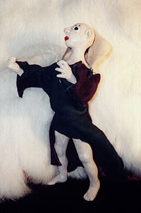Sculpture of a clay man wearing a leather outfit