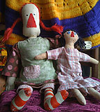 two hand made rag dolls